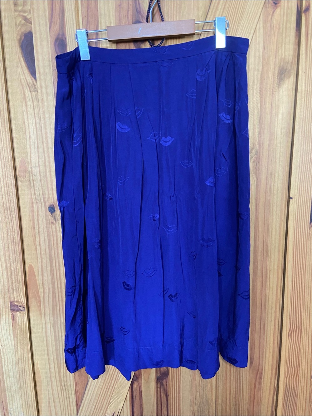 Women's Royal Blue Pleated Midi Skirt with pockets and lipstick pattern